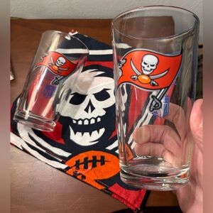 NFL Buccaneers 2 pint glasses and a bandanna.